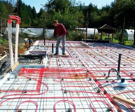 This is about installing hydronic radiant floor heating in a slab floor system. While it was ...