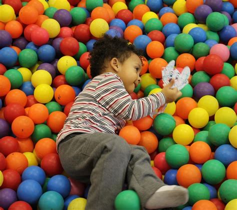 #FlatChuckE Da'jon and Chuck E are having fun in the ball pit! They are ...