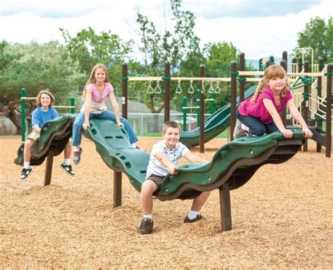 Kindergarten Kids Playing On The Playground