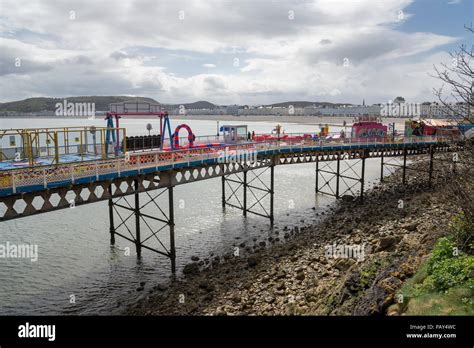 Childrens attractions on the pier at Llandudno, North Wales, UK Stock Photo - Alamy