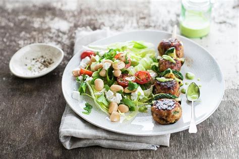 Chicken Meatball And Courgette Brochette, White Haricot Bean Mixed Salad Photograph by Thys ...