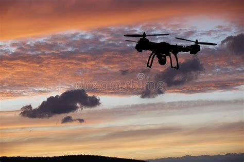 Innovation Concept. Silhouette of Drone Flying on Sunset Stock Image - Image of flight, filming ...