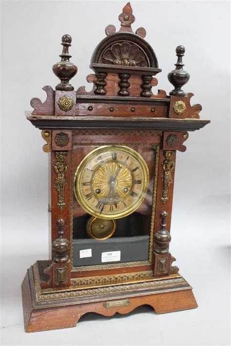 Antique French wooden mantle clock, (with pendulum but no ke