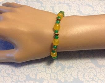 Items similar to Emerald Beaded Bracelet on Etsy