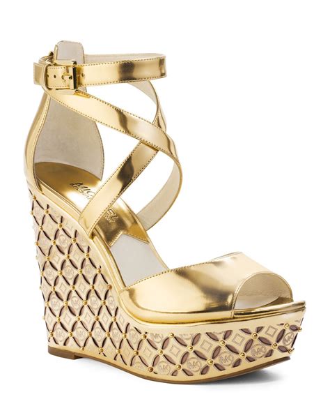 Michael Kors Gabriella Monogram Wedge in Gold | Lyst