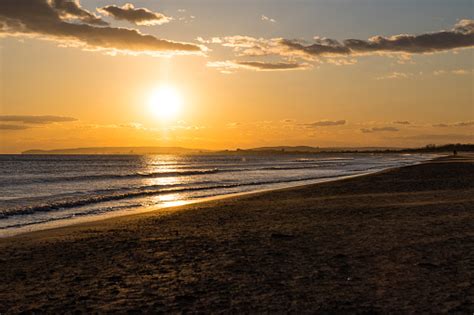 Sunset On Couchant Beach In La Grandemotte Stock Photo - Download Image Now - Architecture ...