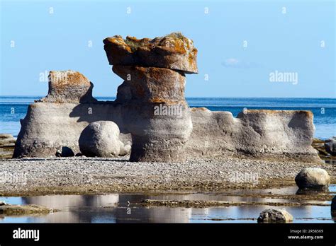 Rock formation formed by wind erosion and water erosion, Mingan Archipelago National Park ...