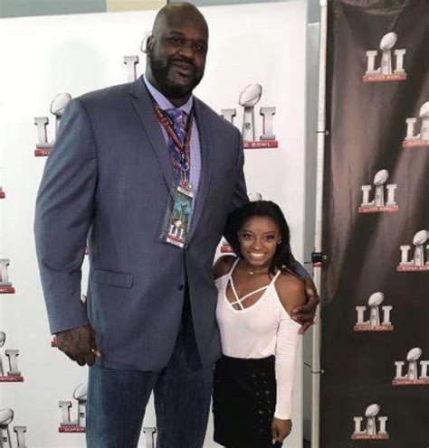 Shaq holding his daughter Simone : r/ShaqHoldingThings