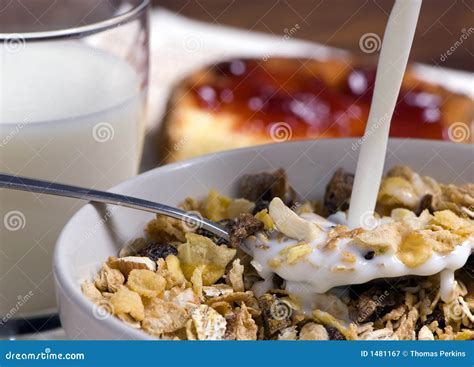 Morning Cereal Pouring The Milk Royalty Free Stock Photography - Image: 1481167