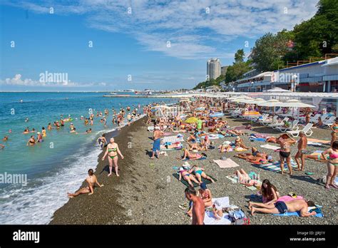 Sochi, Russia - 06 July, 2017.People swim and sunbathe at the city ...