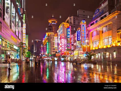 Night time on Nanjing Road east, Shanghai city centre, Peoples Republic of China, PRC, Asia ...