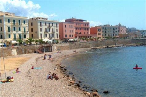 This beach spreads out right in front of some beautiful buildings in Civitavecchia. The pebbly ...