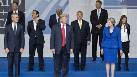 NATO strengthened at summit, despite Trump's threats and gripes