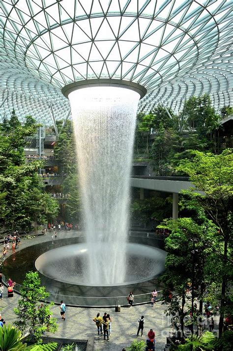 The Jewel waterfall monorail track gardens and visitors Changi Airport Singapore Photograph by ...