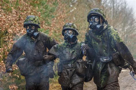 Conscripts from The Engineer Regiment of the Royal Danish Army help ...