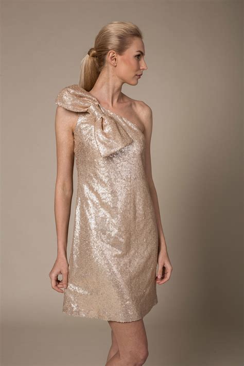 One shoulder gold sequin evening dress with bow shouldr detail - Le Parole