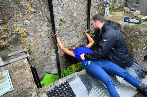 Kissing the Blarney Stone - A Walk in the World - Blarney Castle in Cork