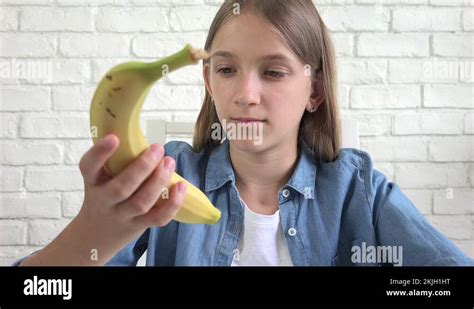 Kid eating banana Stock Videos & Footage - HD and 4K Video Clips - Alamy