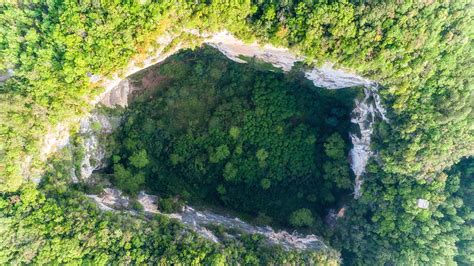 Live: A virtual tour of newly discovered giant karst sinkhole in China ...