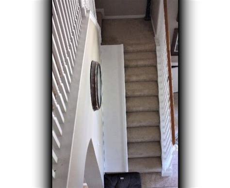 Remodelaholic | DIY Stair Slide, or How to Add a Slide to Your Stairs