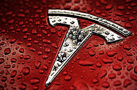 Red-Tesla-Emblem-Logo-Water - TESLARATI