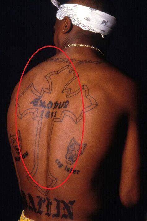 Tupac Shakur’s 21 Tattoos & Their Meanings – Body Art Guru | Tupac tattoo, Thug life tattoo ...