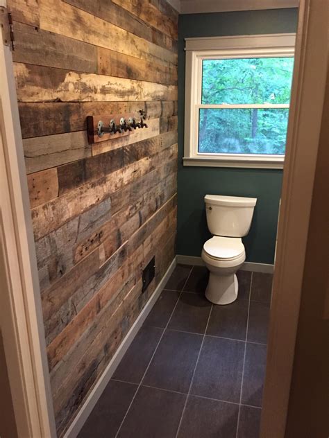 Bathroom accent wall from reclaimed barn wood. | Bathroom accent wall, Wood wall bathroom ...