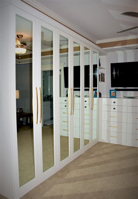 Custom White Built-In Closet Unit by Belak Woodworking LLC | CustomMade.com