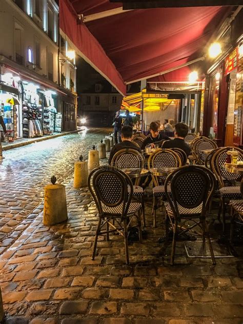 Evening Diners at Outdoor Cafe on Montmartre, Paris, France Editorial ...