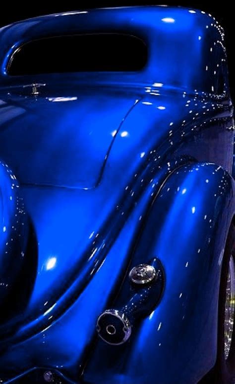 Stylish Dark Blue Car in Black Background