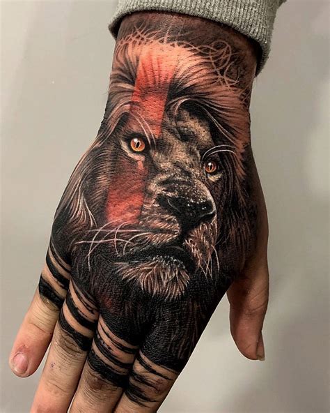 Lion Hand Tattoo