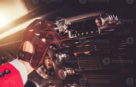 Driver Changing Radio Station In His Classic Car 24636219 Stock Photo ...