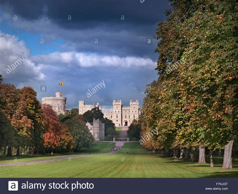 Windsor Castle flying Royal Standard viewed down the Long Walk with ...