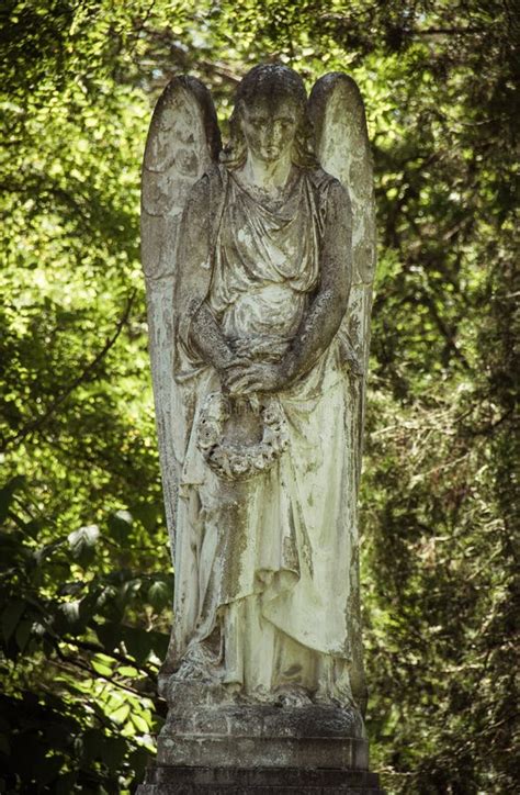 Sculpture of a Grieving Angel Stock Photo - Image of statue, stone: 230725368