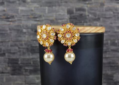 Close-up of Gold Earrings with Pearls · Free Stock Photo