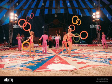 Inside big top tent Circus performers juggling act Stock Photo - Alamy