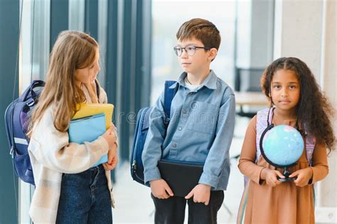 Portrait of Kids Standing in Elementary School Hallway Stock Image ...