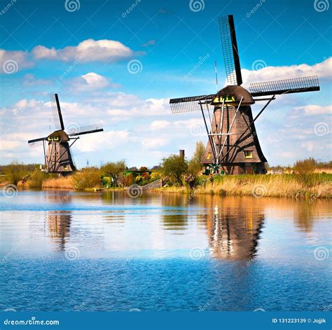 Famous Windmills in Kinderdijk Museum in Holland Stock Image - Image of adventure, excursion ...