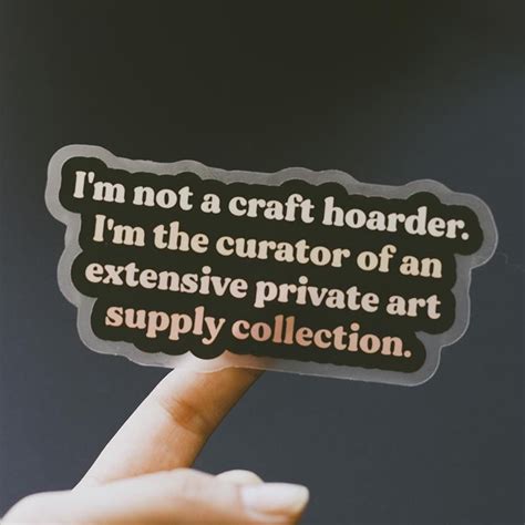 someone holding up a sticker with the words i'm not a craft hoarder, i ...