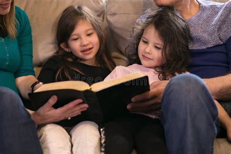 Family Reading the Bible Together Stock Image - Image of grandchildren, granddaughters: 181825975