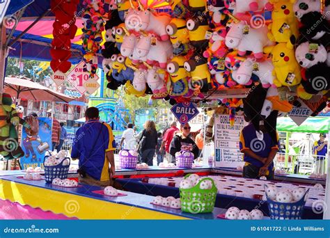 Ball Toss Carnival Game and Prizes Editorial Photography - Image of ...