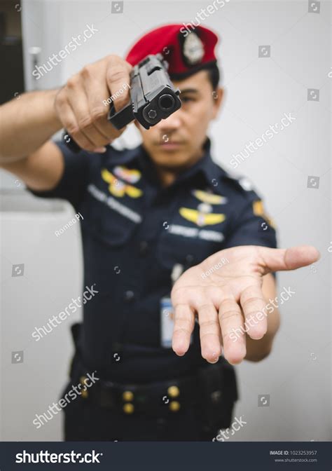 Police Officer Uniform Red Beret Aiming Stock Photo 1023253957 ...