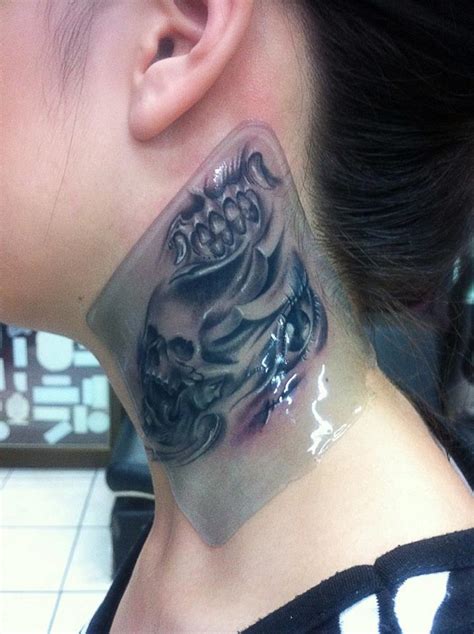 Skull Neck Tattoo