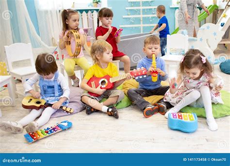 Children Learning Musical Instruments on Lesson in Kindergarten or Preschool Stock Photo - Image ...