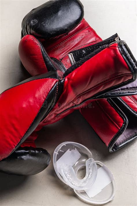 Boxer Teeth Protection and Pair of Boxing Gloves Stock Photo - Image of sports, style: 157731158