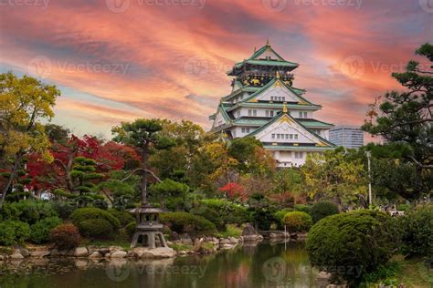 Osaka castle in Autumn foliage season, is a famous Japanese castle, landmark and popular for ...