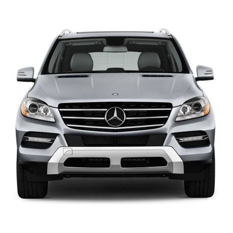 the front end of a silver mercedes suv