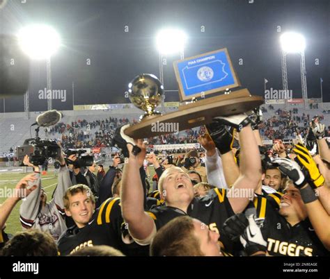 Members of the North Allegheny football team celebrate their 63-28 ...