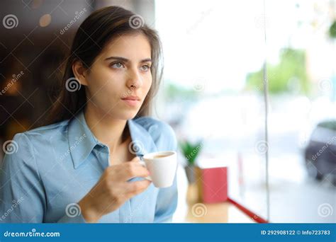 Distracted Woman Drinking Coffee in a Bar Stock Photo - Image of coffe ...