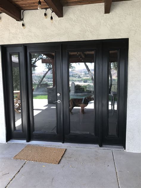 Black French doors finally done | Sliding french doors patio, Sliding french doors, French doors ...